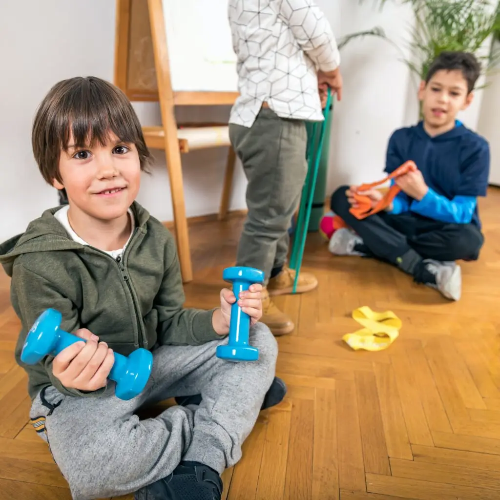 Children Exercising Indoors